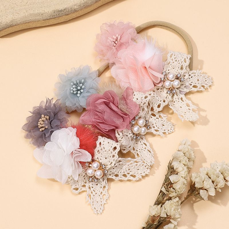 Grenziwwerschreidend nei Kanner Kappschmuck Puppelchen léif Perlblummen Hoeraccessoiren Puppelchen Kombinatioun Blummen DIY fein Hoerband Grousshandel_voghion.com