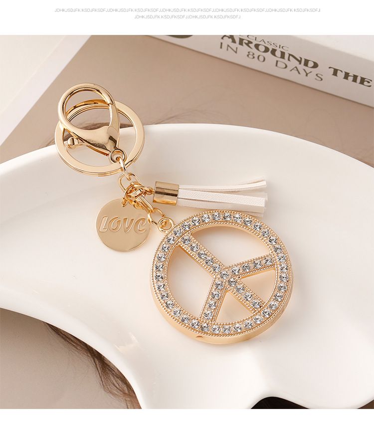 Portachiavi con nappa con logo creativo della pace in versione coreana, borsa in metallo con diamanti intarsiati, ciondolo, accessori per auto, macchina per artigli,_voghion.com