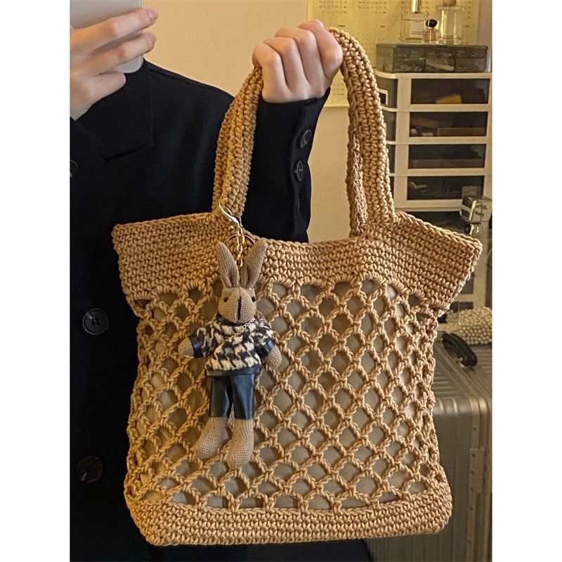 Filet de pêche tissé en herbe ins, version coréenne, série forêt, fourre-tout ajouré, sac de plage, sac à main pour femmes, nouveau modèle 2024_voghion.com