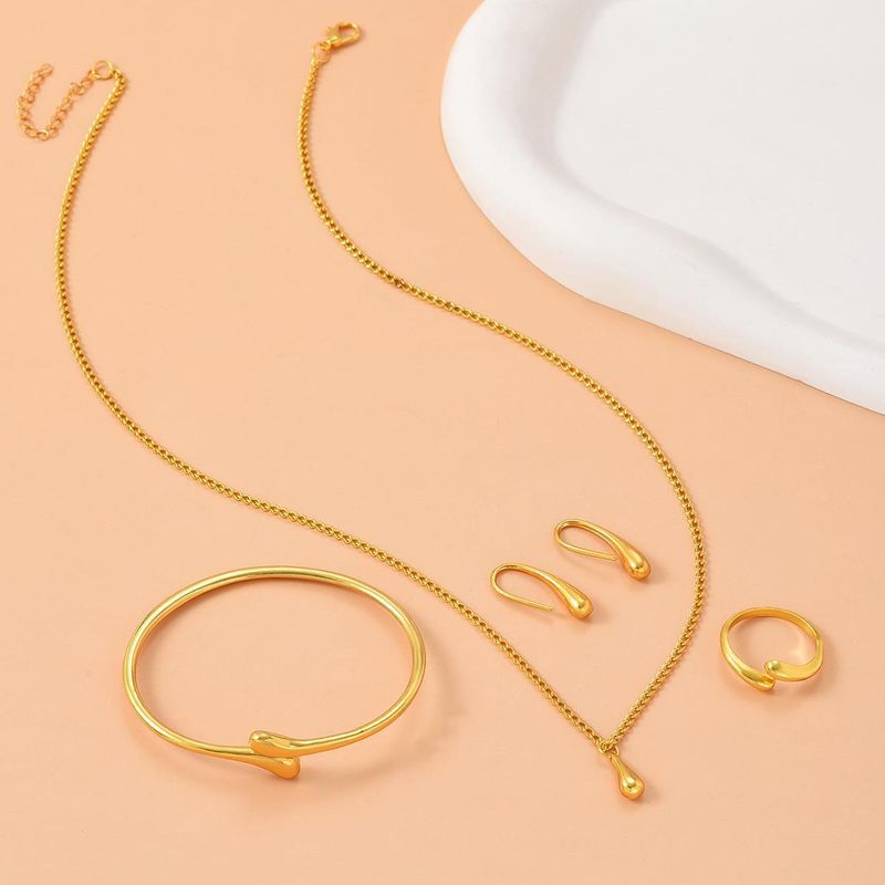 Conjunto de quatro peças de colar gota d'água, moda diária simples, conjunto de colar, brincos, anel e pulseira_voghion.com