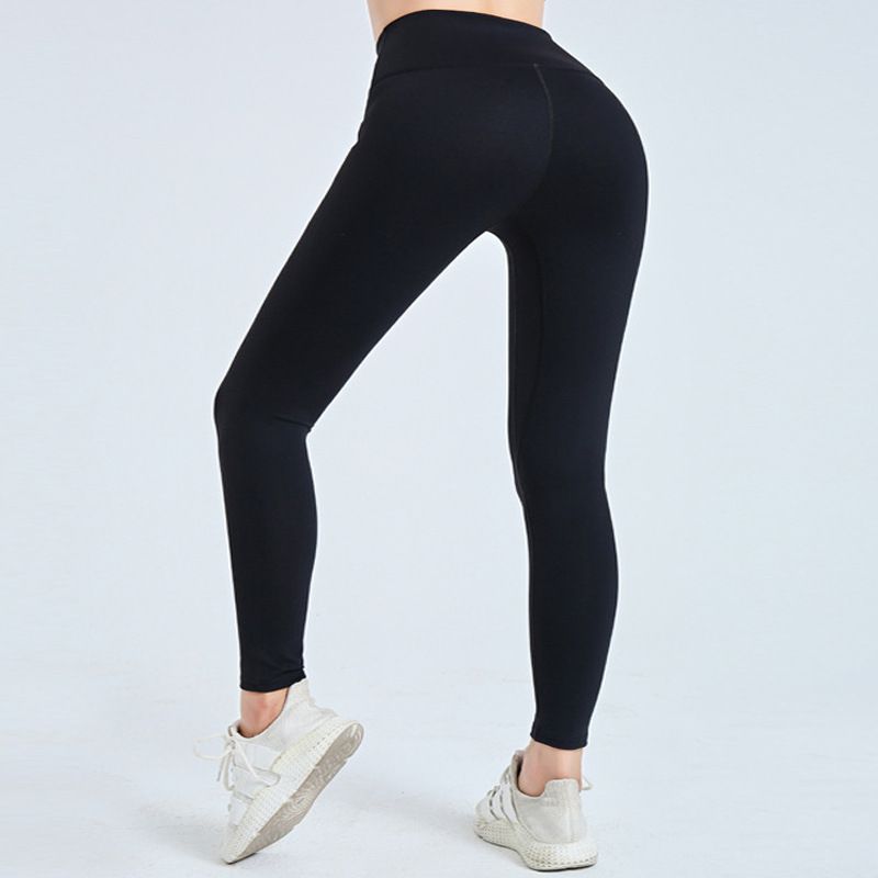 Pantaloni sport strâmți pentru femei, de culoare piersică, cu talie înaltă, pentru ridicarea feselor și controlul abdomenului, care absorb transpirația și sunt pantaloni de yoga slăbiți._voghion.com