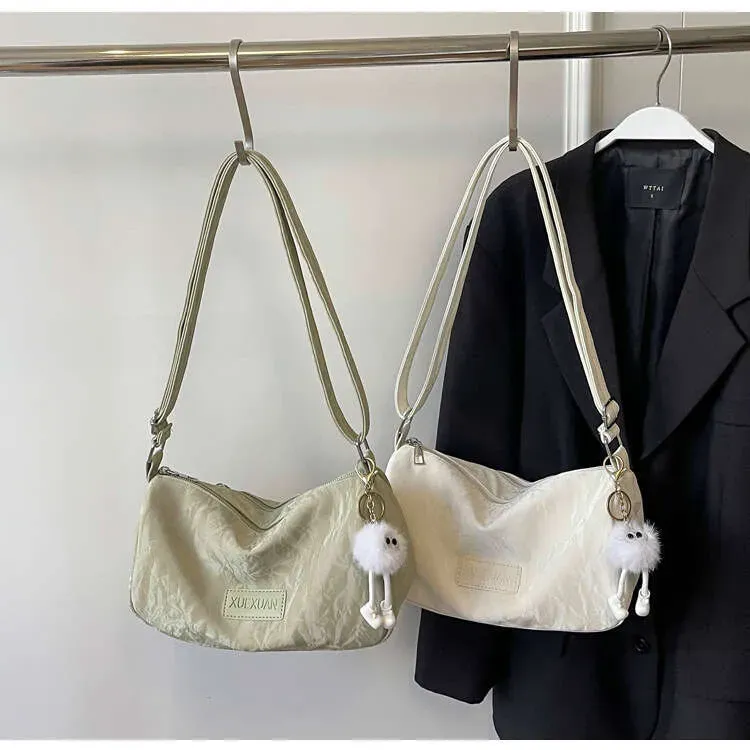 Nuovo stile monospalla per donna, semplice e versatile, grande capacità, resistente all'acqua, leggero e lussuoso, alla moda_voghion.com