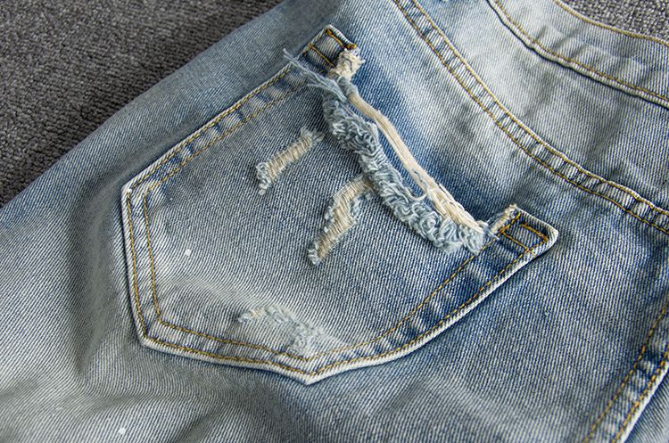Herrenbekleidung, gewaschene und abgenutzte Tintenspritzer, große Löcher, trendige, originelle Herren-Jeansshorts für Jugendliche_voghion.com