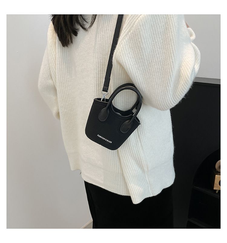 Borsa a secchiello da donna, alla moda, con tracolla monospalla, stile Candy Lover, con rossetto, da portare a spalla, rossa_voghion.com