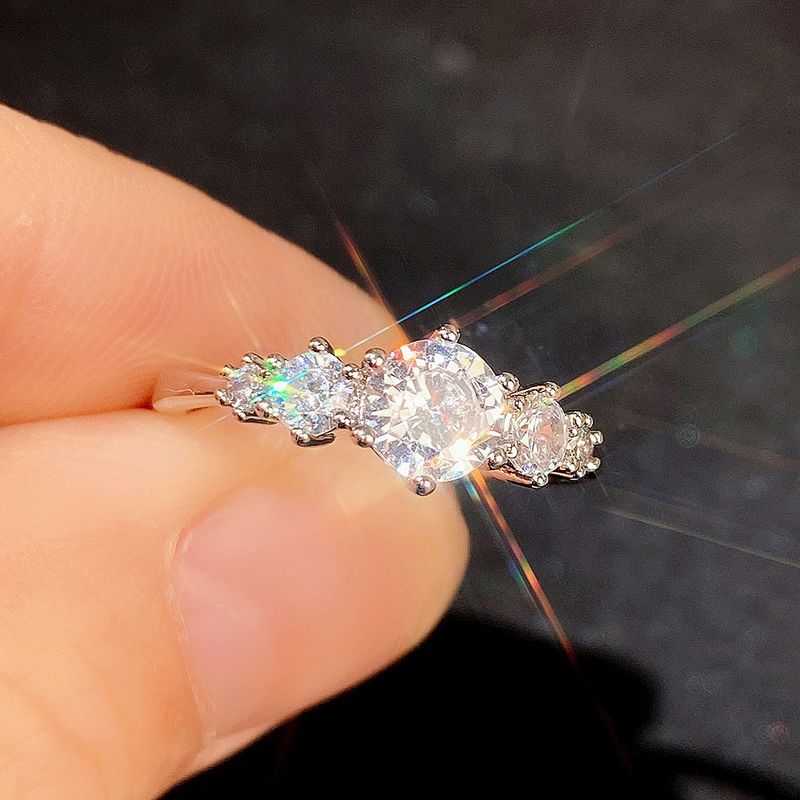 Cao Shi, nuovo anello alla moda con zirconi rotondi scintillanti_voghion.com