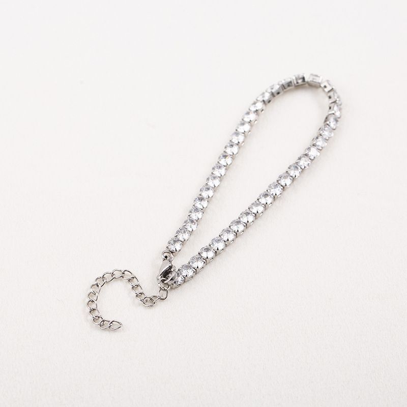 Bracciale da tennis in acciaio al titanio, leggero, alla moda, stile hip-hop INS, regolabile, da 4 mm, con zirconi, per uomo e donna._voghion.com