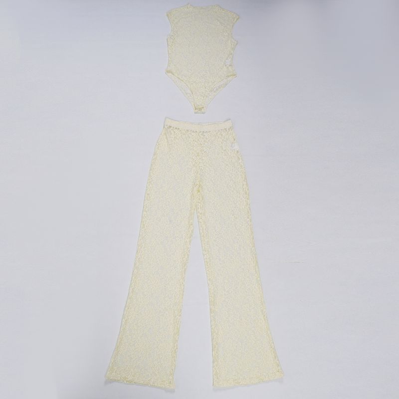 Elegante completo in pizzo da due pezzi: top trasparente aderente e pantaloni con elastico in vita per donna_voghion.com