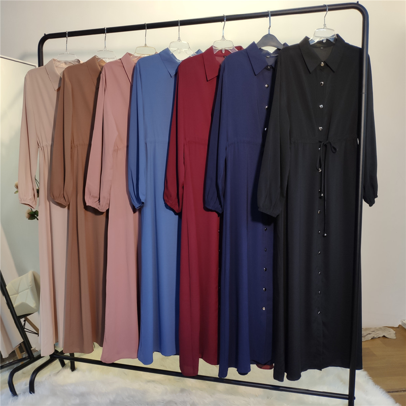 Roupas femininas nova moda muçulmana lapela cor sólida botão completo vestido fino saia longa_voghion.com