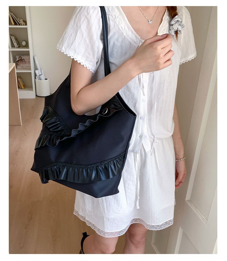 Borse alla moda di quest'anno 2025 Nuova versione coreana Moda Foglia di loto Versatile Spalla Donna Grande capacità Portatile_voghion.com