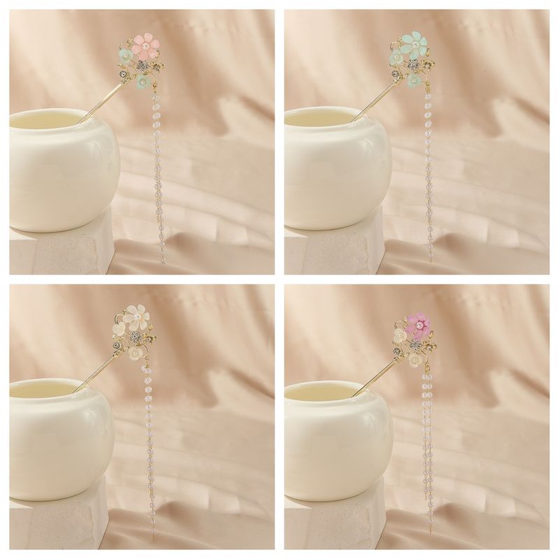 White Magnolia Hairpin for Women New Chinese Style Ancient Style High end Hairpin Hanfu Temperament Hair Accessories Hairpin Step Shaking_voghion.com