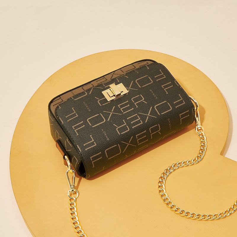 FOXER/ Borsa a tracolla vintage da donna con stampa Golden Fox e catena per telefono_voghion.com