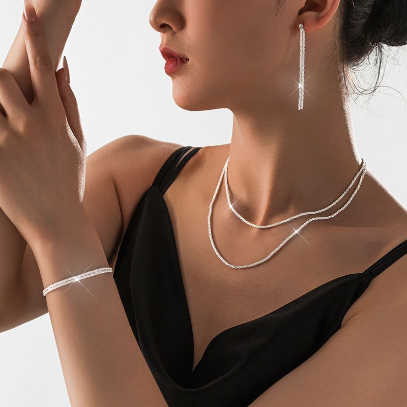 Set di gioielli con collana e bracciale a catena per clavicola placcati in argento lucido, accessori minimalisti da donna con cielo stellato_voghion.com