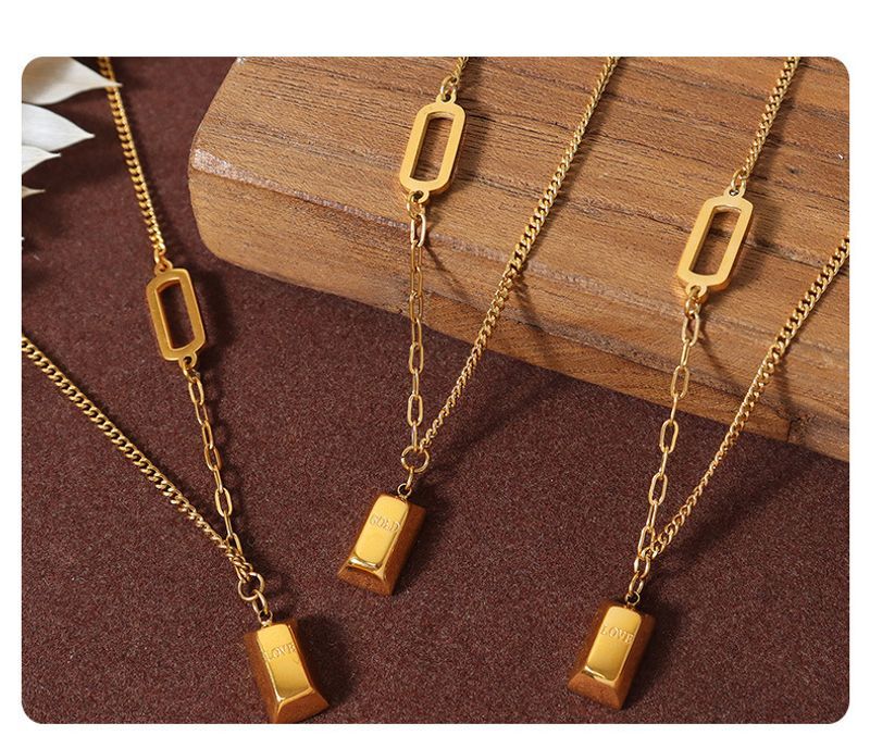 Collana con ciondolo geometrico in acciaio al titanio leggero placcato oro, design di nicchia di alta qualità, semplice e versatile._voghion.com