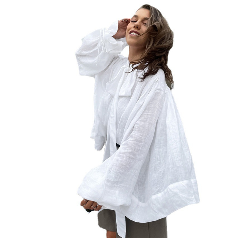 Camicia bianca con maniche a sbuffo e fiocco in puro cotone, elegante modello da donna, stile pendolare francese, primavera 2023_voghion.com