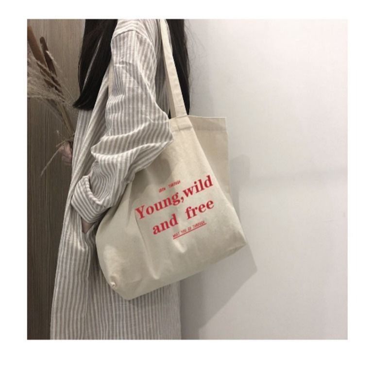 2025 New Zipper Letter Large Capacity Bag Korean Style Simple Literary Women's Canvas Tote Shopping_voghion.com