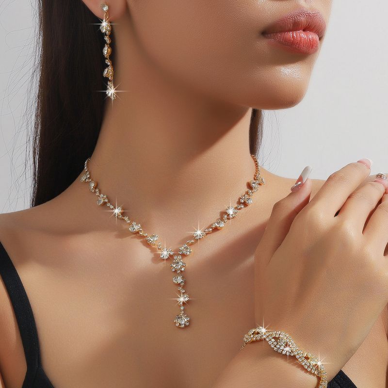 Brautset Accessoires Halskette Armband Ohrringe dreiteiliges Set Nische High-End-Schmuckset Kleid vielseitiger Schmuck_voghion.com