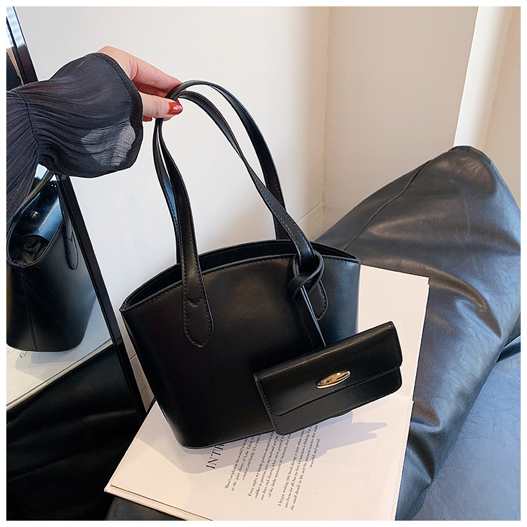 Borsa piccola portatile di moda estiva nuova borsa a secchiello casual semplice da donna 2023 borsa per ascelle suocera con trama di nicchia_voghion.com
