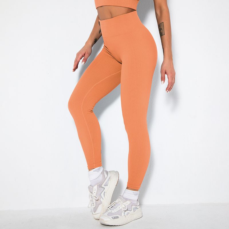 Seamless solid color thread tight fitting waisted high elastic hip lifting yoga pants, sports running fitness pants_voghion.com