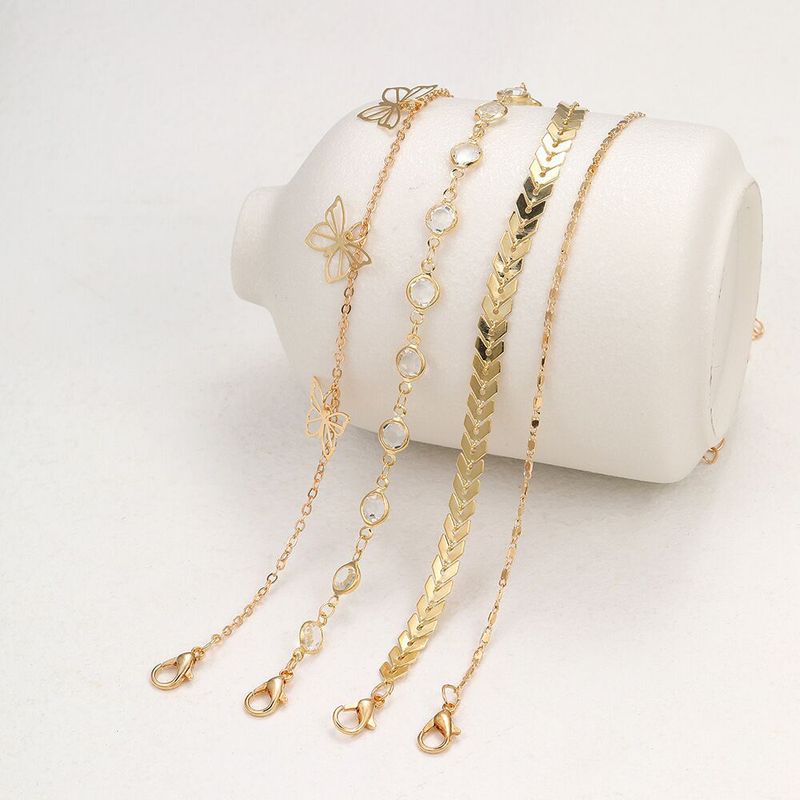 4-Piece Set Of Fashionable Simple Multi-Layer Metal Airplane Chain Hollow Butterfly Inlaid Diamond Anklets For Women_voghion.com