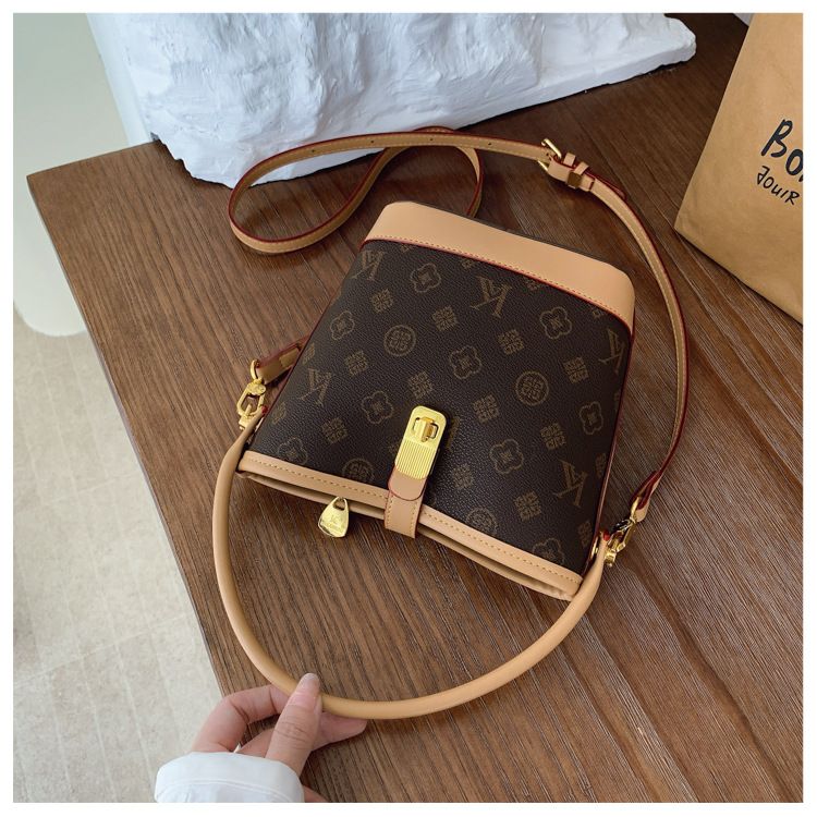 Tendenza di quest'anno: borsa a secchiello leggera e lussuosa stampata per le donne, nuova borsa alla moda 2025, borsa a tracolla versatile_voghion.com