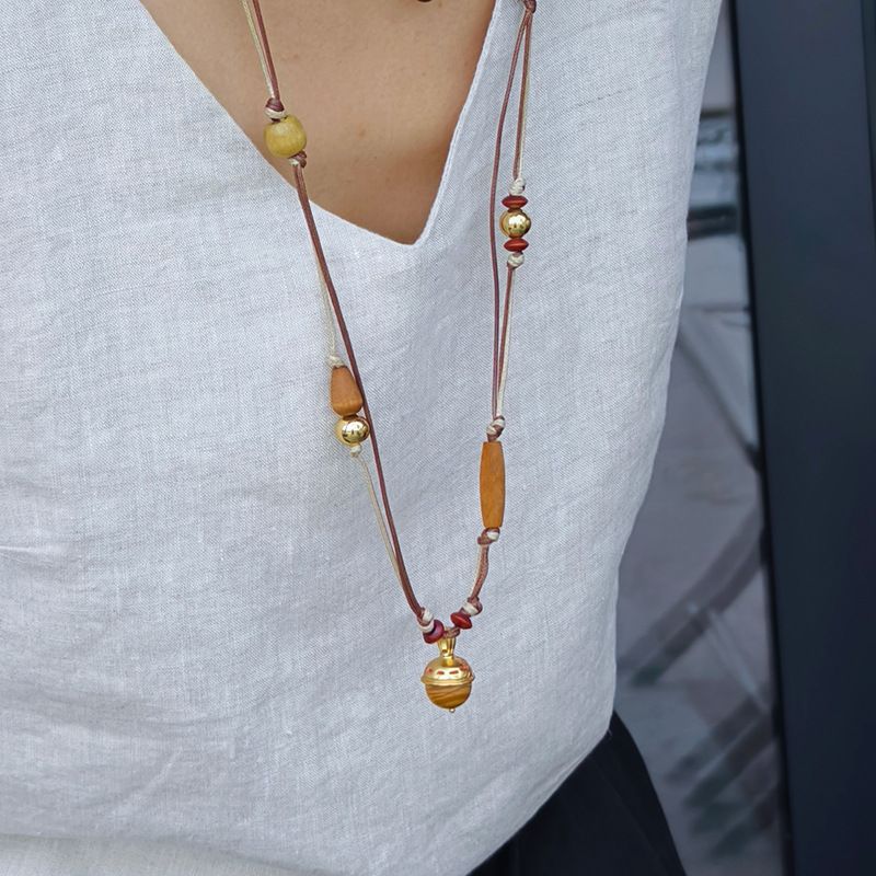 Collana con ciondolo a campana multistrato con perline di legno, corda di cera, stile etnico, design di nicchia, gioielli di senso per_voghion.com