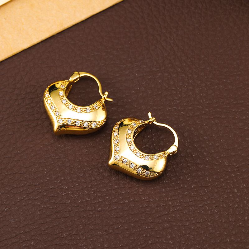 Copper plated real gold ingot heart ear buckle, simple exaggerated, cold and aloof style metal earrings, peach heart,_voghion.com