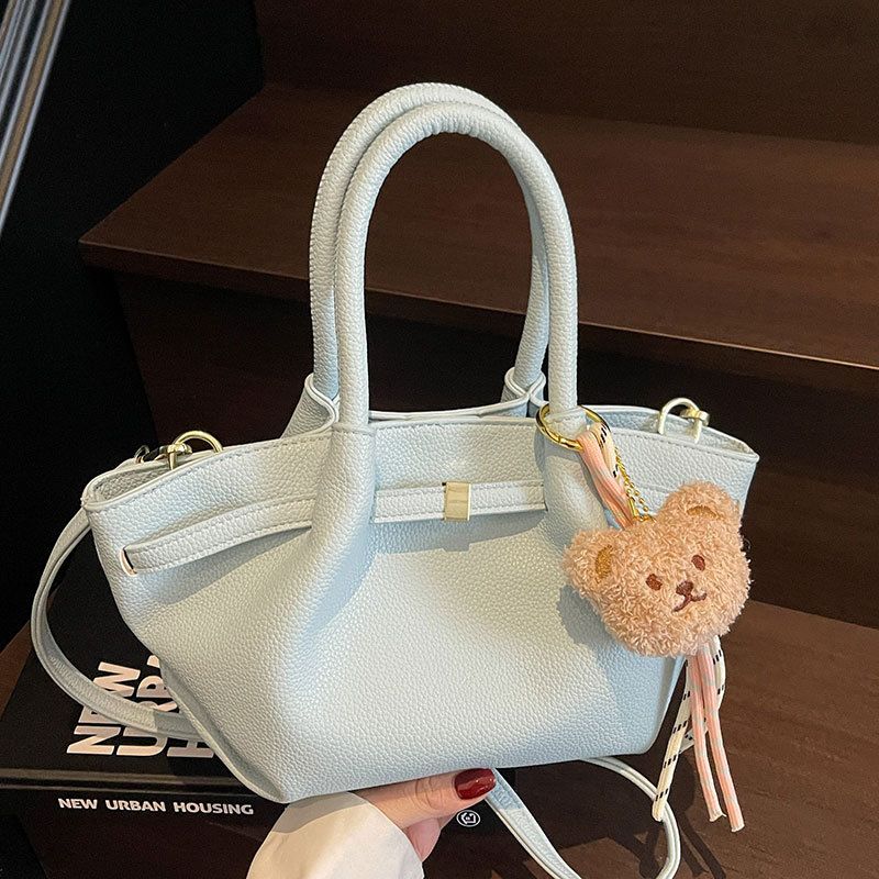 Neue modische, schlichte Crossbody-Tasche für Damen im Frühling/Sommer-Stil mit Plissee-Muster, Korb-Nischen-Design und Litschi-Textur._voghion.com