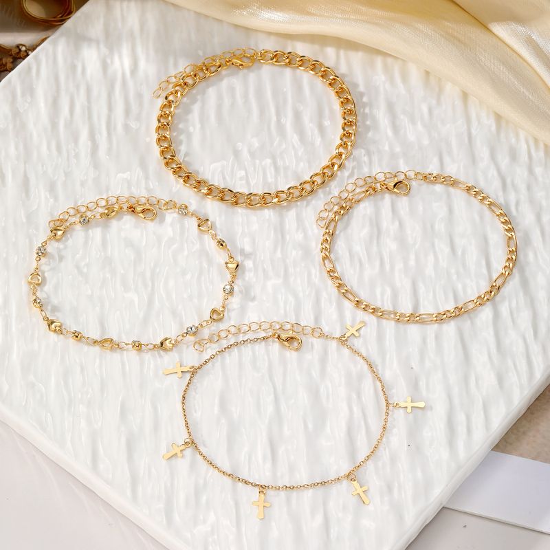 Simple Multi-layer Metal Snake Bone Anklet Female Sexy Beach Cross Fringed Alloy Foot Decoration Body Chain Bohemian Retro Ethnic Jewelry_voghion.com