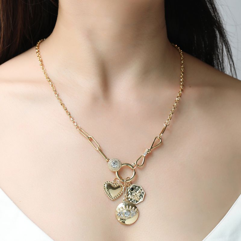 Kenjie Halskette mit Anhänger aus mehreren Elementen, eingelegten Diamanten und Relief-Design mit antiken Münzen_voghion.com