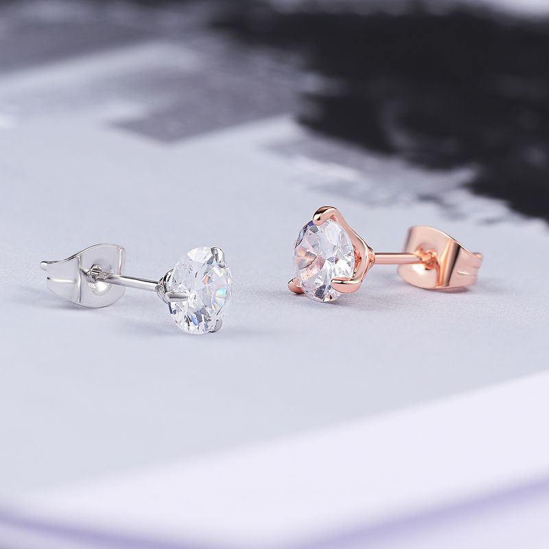 Orecchini unisex semplici e freschi a tre griffe rotondi con diamanti piccoli orecchini_voghion.com