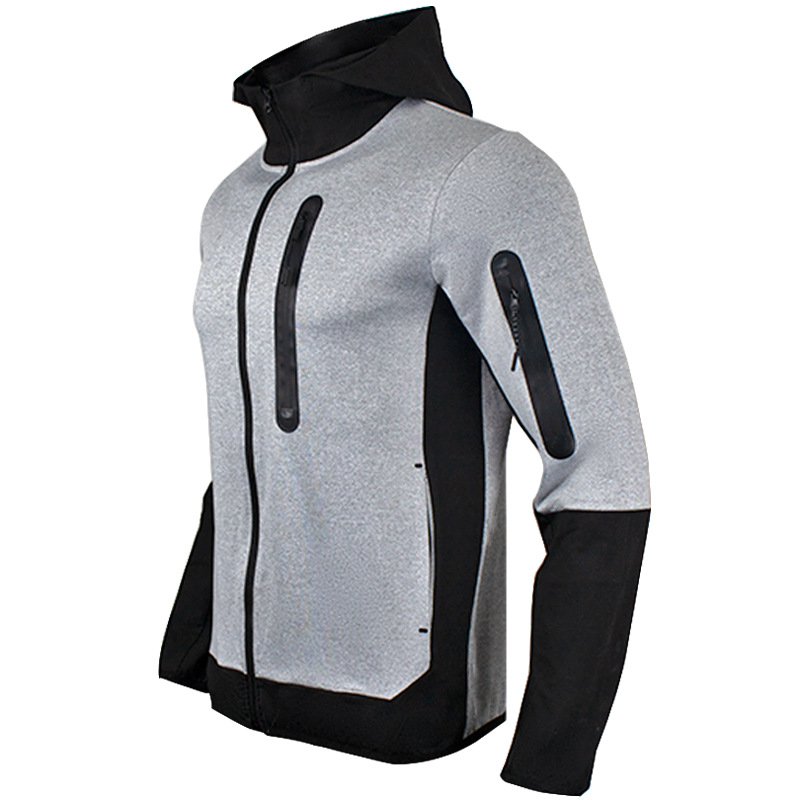 Ein Satz trendiger, lässiger Sport-Herrenanzüge mit Kapuze und farblich passenden Patchwork-Kapuzenpullovern, Jacken und Hosen_voghion.com