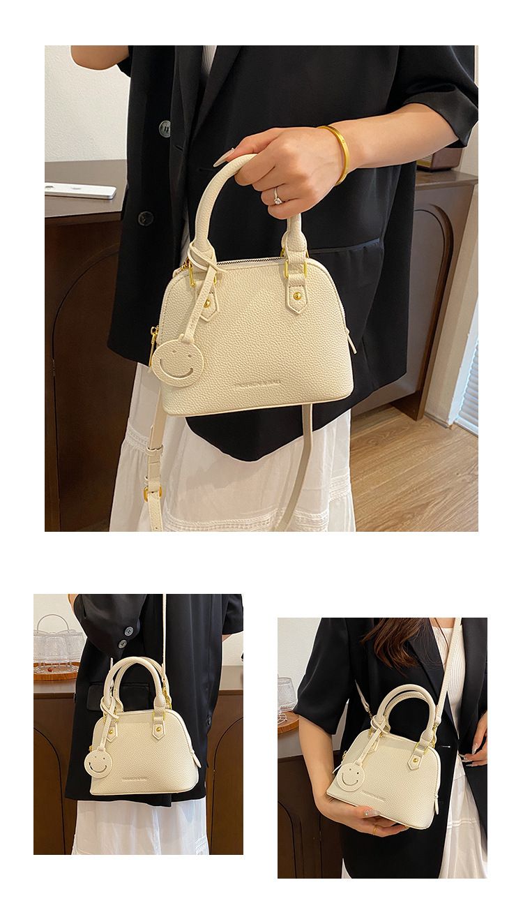 Trendy temperament solid color hand-held shell 2024 new high-end multi-color single shoulder crossbody women's bag_voghion.com