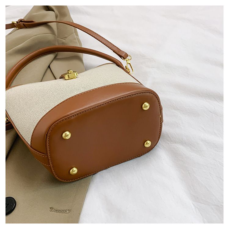 2024 nieuwe tas dames trendy en modieuze draagbare emmertas met klein ontwerp contrasterende kleur splitsen enkele schouder crossbody tas_voghion.com