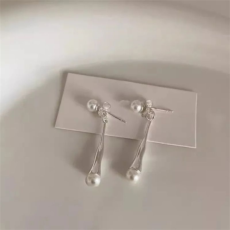 Perla a goccia d'acqua con ago d'argento, coppia di design creativo di personalità di nicchia, orecchini con uno stile fresco e lussuoso per le donne_voghion.com