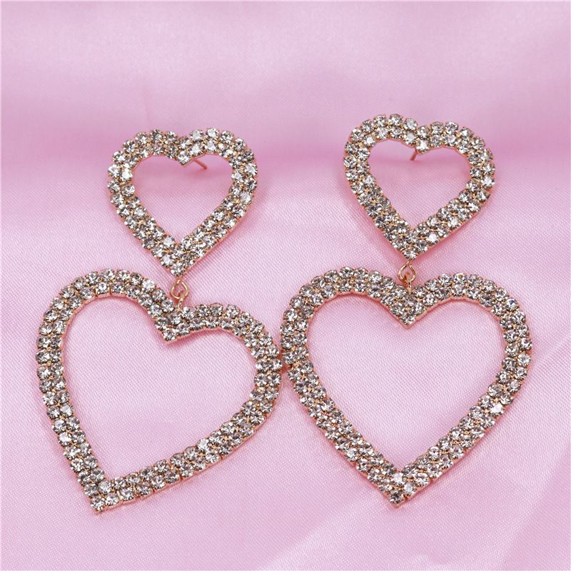 Orecchini femminili romantici dolci a forma di cuore di pesca vuoto di celebrità di Internet di moda coreana squisita_voghion.com