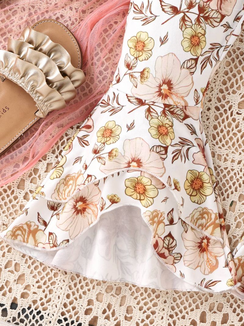 Un set in due pezzi di completi per ragazze vento, primavera ed estate, con bretelle per bambini piccoli, top con fiocco, stampa_voghion.com