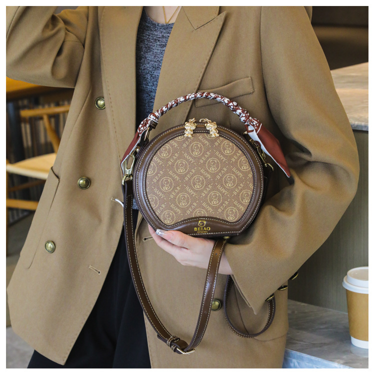 Borsa per torta rotonda Borsa a tracolla diagonale da donna piccola borsa rotonda Borsa moda autunno e inverno_voghion.com