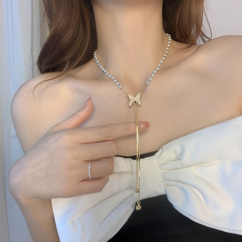 Pearl necklace for women, necklace design, niche butterfly tassel pendant, clavicle chain 2023 new_voghion.com