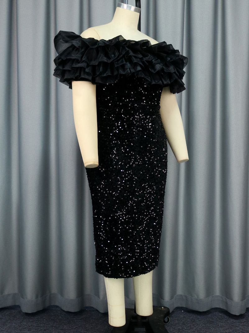 Abito da donna con paillettes in rete. Abito da festa_voghion.com