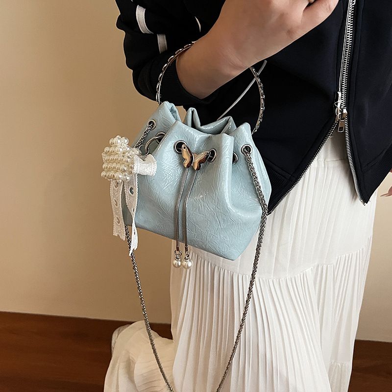 Niche Designer For Women 2025 New Summer Fashion Handbag Bucket Versatile Commuter Chain Crossbody Bag_voghion.com
