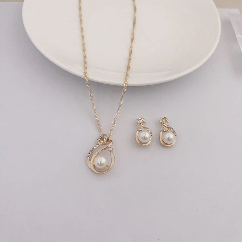 Set di orecchini con collana di perle e diamanti a forma di 8 geometrici, accessori da sposa_voghion.com