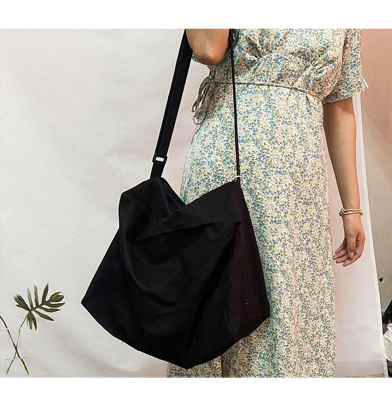 Fan Han Feng Borsa a tracolla singola Semplice e casual Borsa a libro pigra in tela tinta unita versatile Instagram da donna_voghion.com