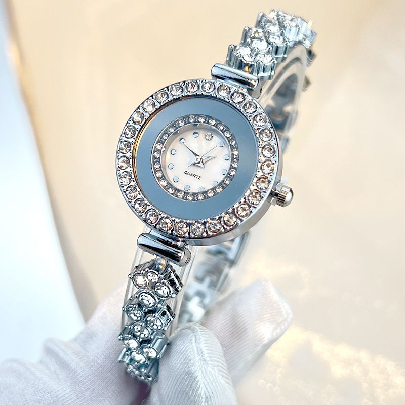 Luxuriöse High-End-Quarzuhr für Damen mit eingelegtem Glas und reflektierendem Spiegel_voghion.com