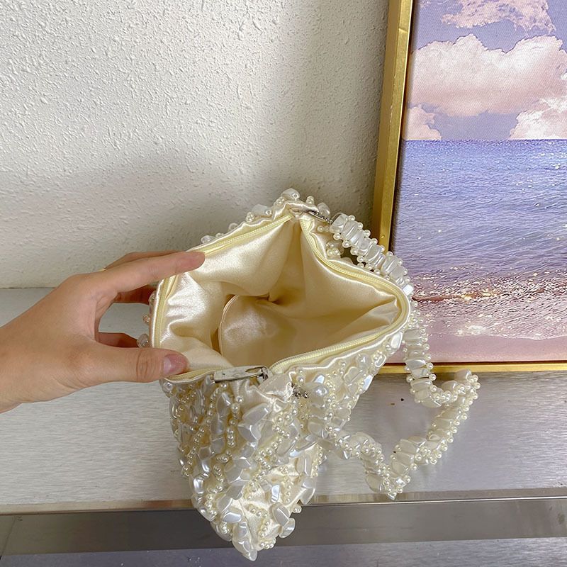 Borsa di lusso leggera con design a nicchia irregolare perlato sotto le ascelle, elegante e dal temperamento francese_voghion.com