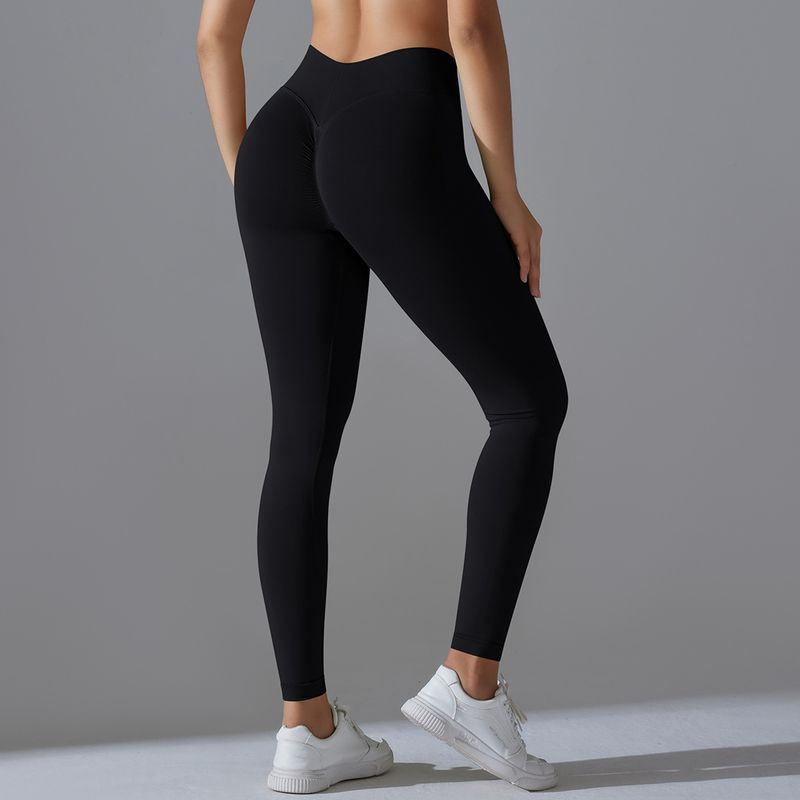 Seamless Knitted Solid Color Tight High Waist Peach Hip V-Waist Yoga Sports Running Fiess Pants_voghion.com