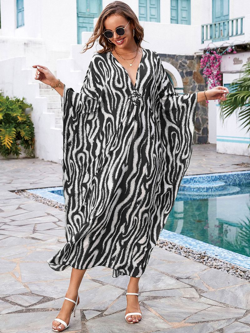 „Strandkleid mit Bohemian-Print – Fließendes langes Kleid für Pool und Urlaub“_voghion.com
