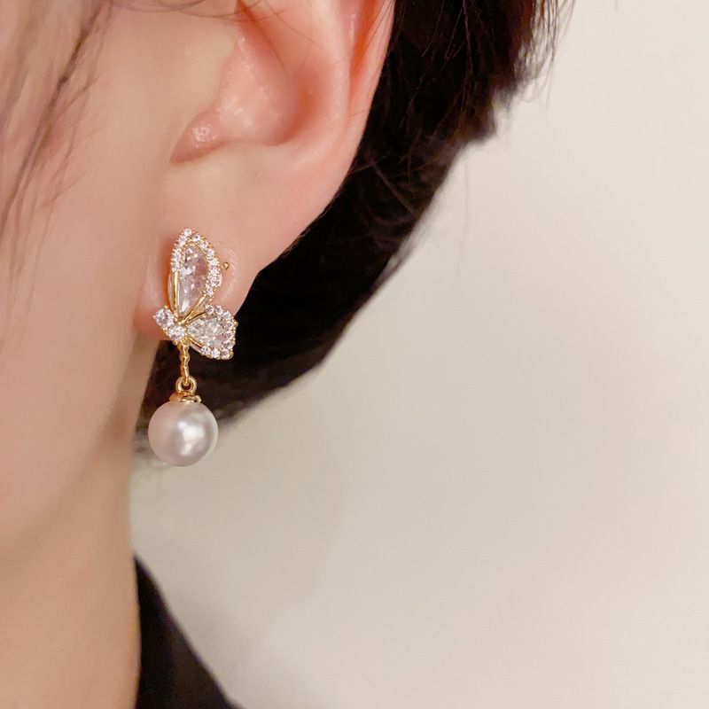 Orecchini a forma di farfalla in zircone con design di nicchia unico per donna, eleganti orecchini a forma di ago in argento di alta qualità, leggeri e di lusso._voghion.com