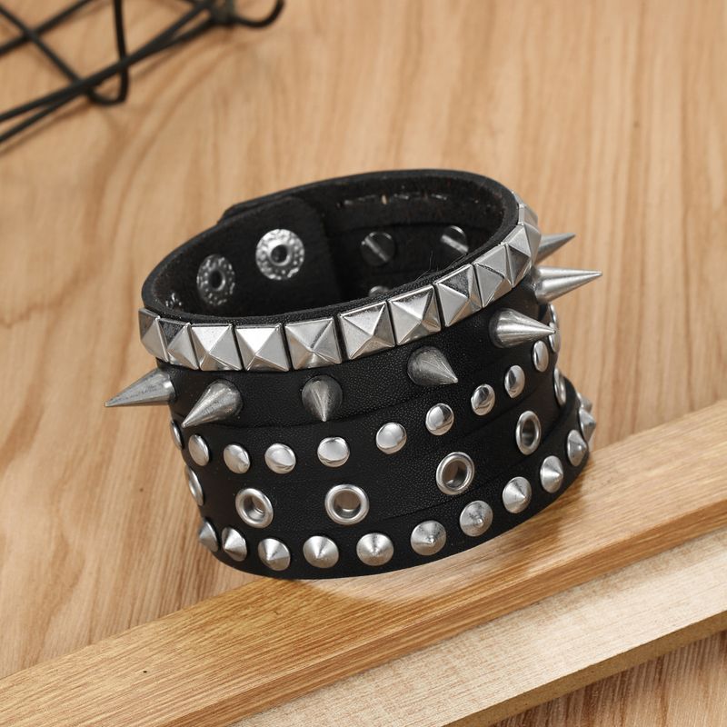 Bracciale in pelle intrecciata con motivo punk con borchie, largo, da uomo, esagerato e alla moda_voghion.com