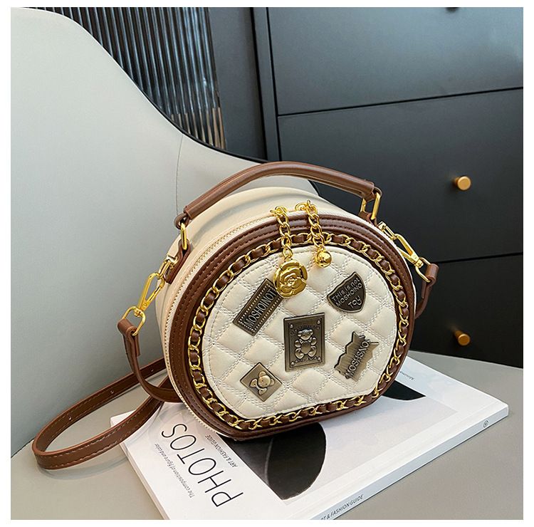 Xiaoxiangfeng Laukku Uusi korealainen versio Muodikas persoonallisuus Splicing Trend Yksi olkapää Naisten Crossbody Pieni Pyöreä Laukku_voghion.com