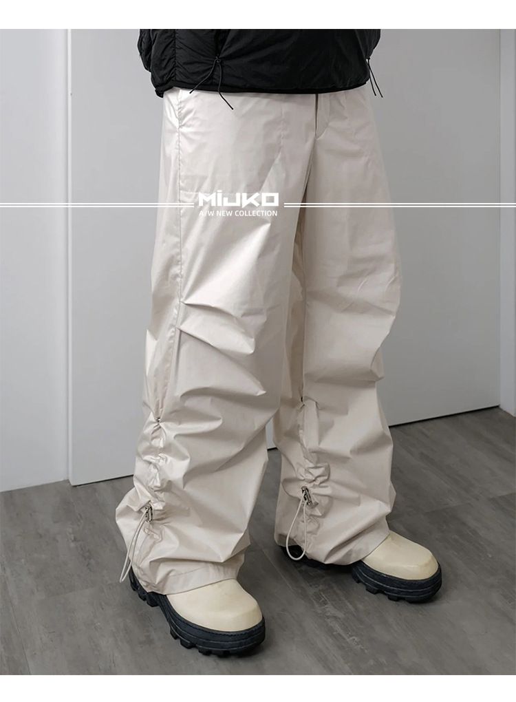 Pantaloni da sci urbani funzionali a gamba larga con coulisse per uomo e donna, pantaloni casual bianchi con pieghe al ginocchio dello stesso stile_voghion.com